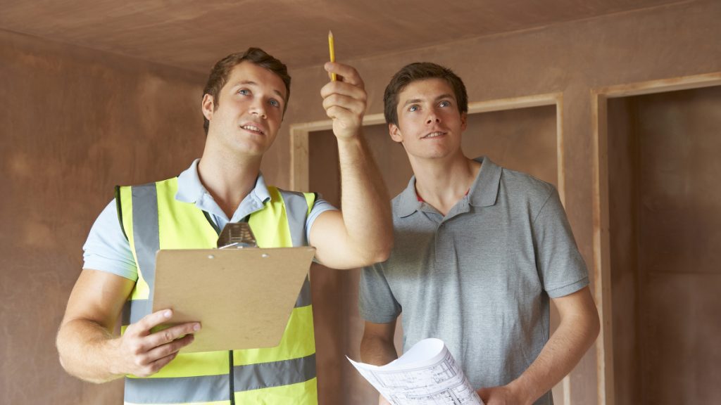 two man planning a home renovation